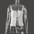Front detail of white lace-up corset camisole featuring ribbon ties and stitched seams - S / White