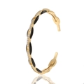 Golden open bangle featuring oval black gemstones with crystal accents and mirror reflection - Black Enamel (S84-9)