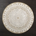 Round jute placemat with white lace mandala pattern on a dark wood background - 38cm / White Lace Pattern