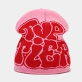 Close-up of pink beanie featuring red jacquard knit heart and urban letter patterns - Deep Pink