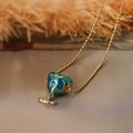 Goldene Herz-Emaille-Halskette mit blau-grünem Muster und Wal-Anhänger für Damen - Blauer Erd-Herz & Flugzeug Anhänger / Gold