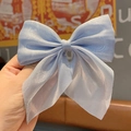 Light blue translucent tulle bow hair clip with a lightweight school style design - Blue Gauze