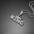 Macro shot of silver-plated hip hop King crown pendant with iced out rhinestones - 60cm Spiga Chain / Silver