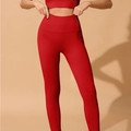 Dettaglio dei pantaloni da yoga rossi senza cuciture a vita alta con trama a coste - S / Rosso