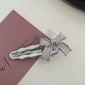 Elegant silver alloy bow hair clip with pink enamel on a decorative pink card - Silver/Pink-Enamel Bow