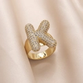 Adjustable gold plated letter K ring with clear cubic zirconia pavé on beige silk - Small / Letter K