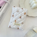 Detail of white quilted cotton passport cover with cute bear and dog animal patterns - Small Grey Elephant
