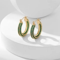Gold-plated C-shaped hoop earrings featuring three rows of micro-pave green crystals - Green Zirconia