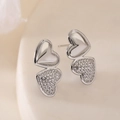 Luxurious silver heart earrings with polished and zircon-encrusted double hearts - Pave Style / Silver