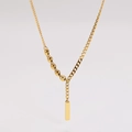 Detalle del collar en Y dorado con eslabones de grano de café y colgante rectangular - Dorado