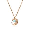 Golden crescent moon necklace with sparkling crystals and iridescent moonstone pendant - Gold