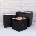 Three-piece set of black marble pattern kraft paper gift bags with die-cut handles - Black Marble Pattern