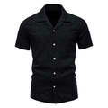 Detail of black summer shirt featuring geometric triangle texture and white contrast buttons - S / Tops / Black