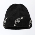 Black ribbed knit beanie with sparkling leaf-shaped rhinestones on the cuff - One Size / Black