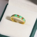 Detail of a vintage golden open ring featuring green enamel and red rose floral patterns - Light Green