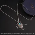 Collana con pendente a testa di lupo e gemma blu con catena in acciaio su pelle nera - Testa di lupo / Catena da 70cm / Testa di Lupo Con Catena in Acciaio da 70cm