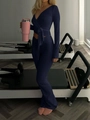 Completo yoga blu navy con top a portafoglio a maniche lunghe e pantaloni a zampa - S / Blu Notte