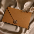 Detail of a brown embossed envelope with a round seal on a luxury silk background - 3 Coffee Envelopes + 10 Kraft Papers + Stickers / Coffee