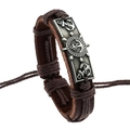 Detail of hand-woven brown PU leather bracelet with retro silver anchor and helm metal plaque - Anchor