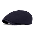 Donkerblauwe newsboy pet met visgraatmotief en een klassiek achthoekig ontwerp - Marineblauw