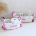 Detail of hand-woven cotton storage baskets with pink tassels and embroidered goodday text - Colorful - Pink Handle