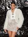 Chic white faux fur jacket paired with silver sequin skirt for trendy winter party wear - XS / White