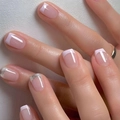 Close-up of French square press-on nails with white tips and silver glitter details - Silver Glitter French Style (CW417)