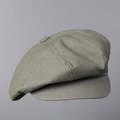 Dettaglio del berretto newsboy vintage oliva con trama in twill e cuciture a 8 pannelli - M (56-58cm) / Verde