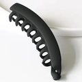 Minimalist matte black vertical banana clip for women on a white ceramic bowl edge - Matte Black
