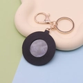 Chic black PU leather heart mirror keychain with golden lobster clasp and shell finish - Round Black