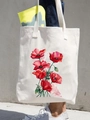Beige canvas shoulder bag featuring red poppy floral print shown on a model - Red Poppy