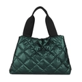 Dark green quilted tote bag with metallic sheen and black canvas handles on white background - Green