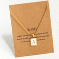 Golden stainless steel necklace featuring a square pendant with letter A shell inlay - Letter A / Gold