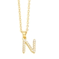 Close-up of gold letter N pendant featuring elegant white pearls on a delicate chain - Gold Letter N