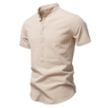 Detail of men's beige cotton linen shirt with mandarin collar and textured fabric - Apricot