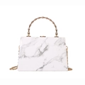Trapezoid marble print handbag with gold bamboo handle and detachable chain strap - White