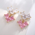 V-shaped gold drop earrings with pink and white square zircons on a white display - Heart/Pink Square Zircon