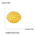 Broche tournesol dorée avec gemmes jaunes et détails précis sur les dimensions et le poids - Jaune