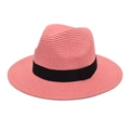 Detail of pink straw fedora hat featuring a contrast black ribbon and woven texture - Pink