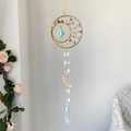 Golden crescent moon sun catcher with colorful crystal stones and celestial Saturn charm - Colorful Fluorite