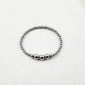 Detailed view of silver stainless steel beads and faceted crystals on a handmade elastic bracelet - Silver Gradient Beads 8mm (YB-1012S-8mm)