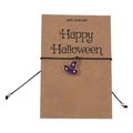 Detail of Halloween wish bracelet with purple witch hat charm on display card - Purple Hat Style