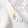 Minimalistische gouden ketting met letter B en zirkonia bloemhanger sieraad - Letter B