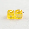 DIY jewelry charm featuring two transparent yellow acrylic dice with silver metal rings - Orange