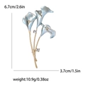 Elegant gold alloy tulip brooch with light blue enamel flowers and rhinestone details - White