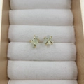 Elegant four-prong natural green stone stud earrings with gold finish in a jewelry box - Green Fluorite