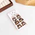 Set of 8 leopard print mini hair claws in tortoiseshell pattern on display card - 2#/8Pcs/Amber Tortoiseshell