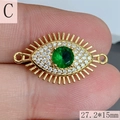Detailed macro of a 27.2x15mm golden evil eye pendant connector with green zircon stone - Style C (27.2*15mm)