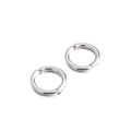 Pair of minimalist silver stainless steel clip-on hoop earrings on a clean white background - Steel Color (KE97316-WGHW)