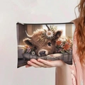 Detail of canvas makeup bag with highland cow print and a sturdy black zipper closure - Warm Tone Baby Highland Cow (jiayingpbb0112)
